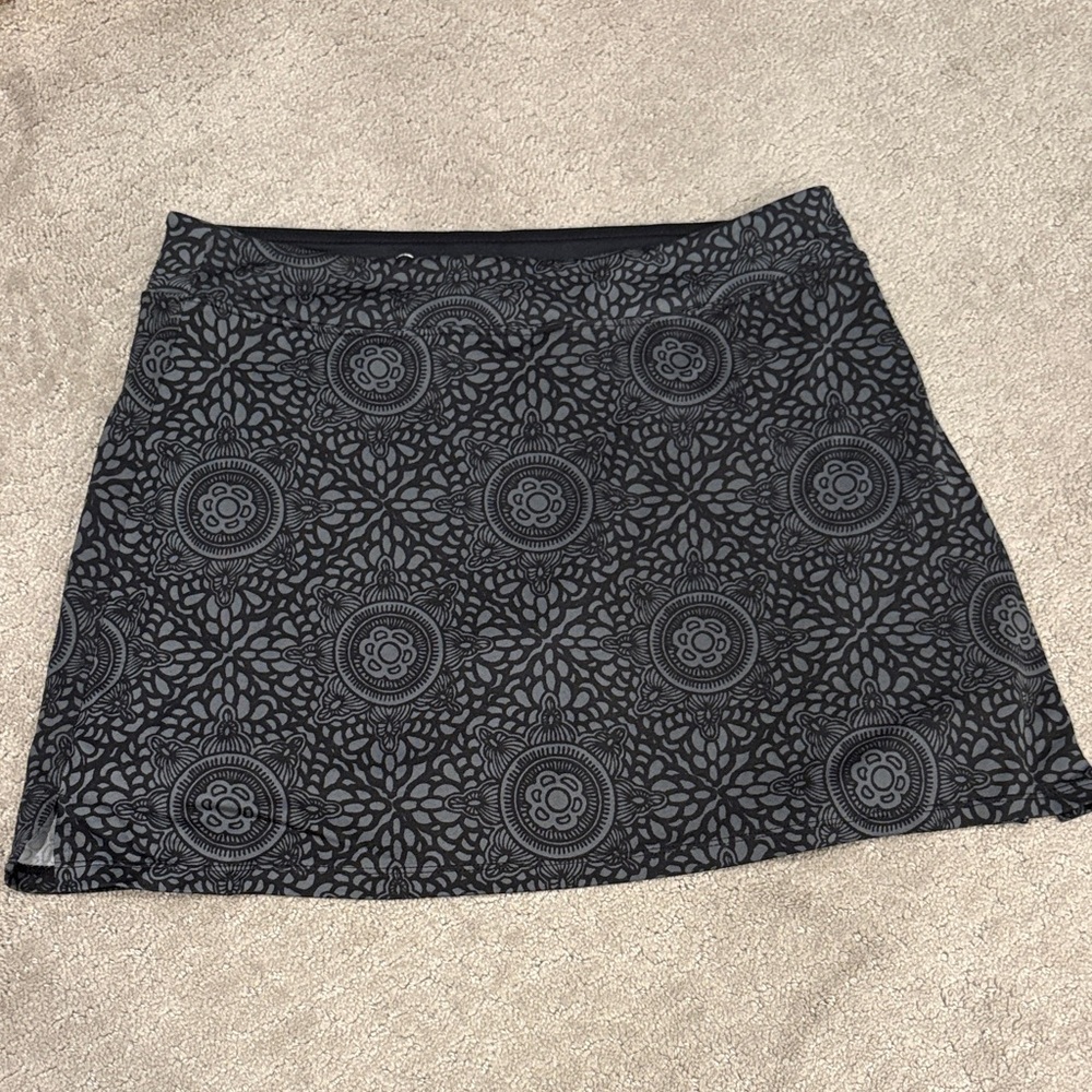 Tranquility by Colorado Clothing Black Patterned Skirt with undershorts.